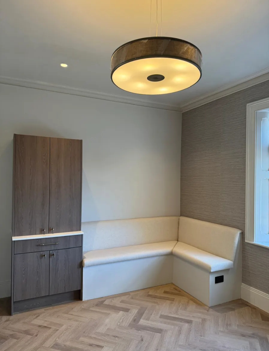 Built-in bench seating and storage by DH Developments in Nailsea